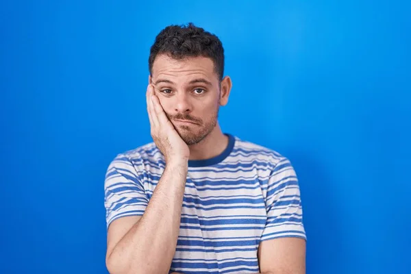 Young Hispanic Man Standing Blue Background Thinking Looking Tired Bored — 스톡 사진