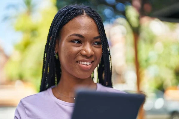 African American Woman Smiling Confident Using Touchpad Street — Stockfoto