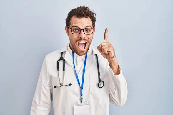 Young Hispanic Man Wearing Doctor Uniform Stethoscope Pointing Finger Successful — Stock Photo, Image