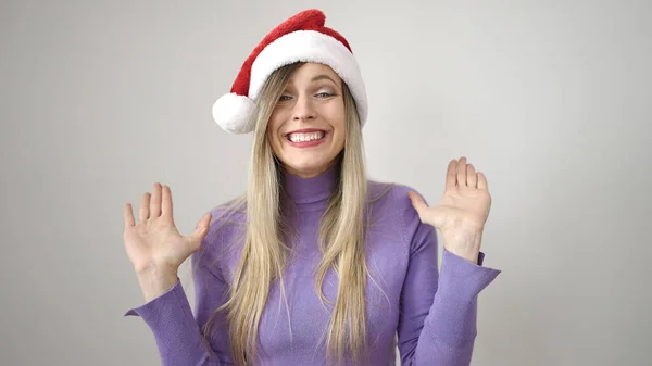 Νεαρή Ξανθιά Γυναίκα Χαμογελαστή Αυτοπεποίθηση Φορώντας Χριστουγεννιάτικο Καπέλο Πάνω Από — Φωτογραφία Αρχείου
