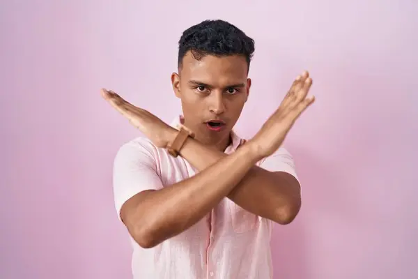 Young Hispanic Man Standing Pink Background Rejection Expression Crossing Arms — Stock Photo, Image