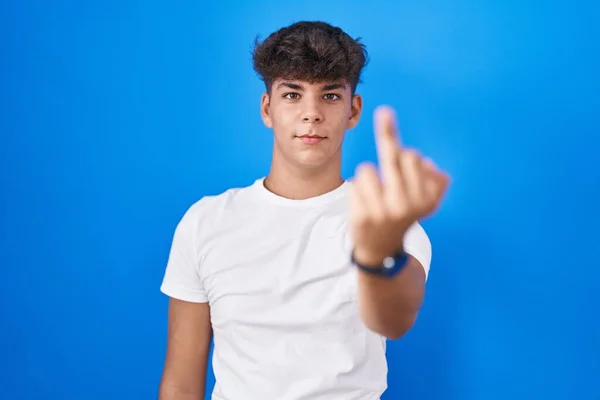 Hispanic Teenager Standing Blue Background Showing Middle Finger Impolite Rude — Stock fotografie