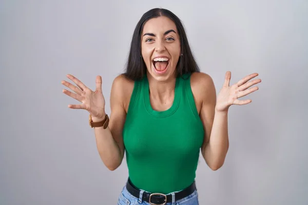 Young Woman Standing Isolated Background Celebrating Crazy Amazed Success Arms — Fotografia de Stock