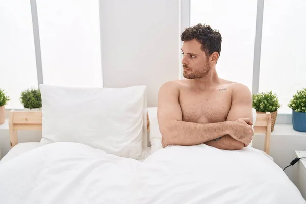 Young Hispanic Man Unhappy Sitting Bed Bedroom —  Fotos de Stock