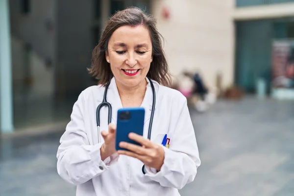 Middle Age Woman Wearing Doctor Uniform Using Smartphone Street — Photo