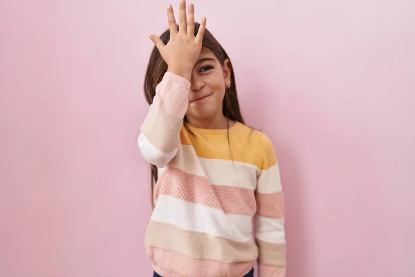 Little Hispanic Girl Wearing Sweater Pink Background Surprised Hand Head — Stock Photo, Image