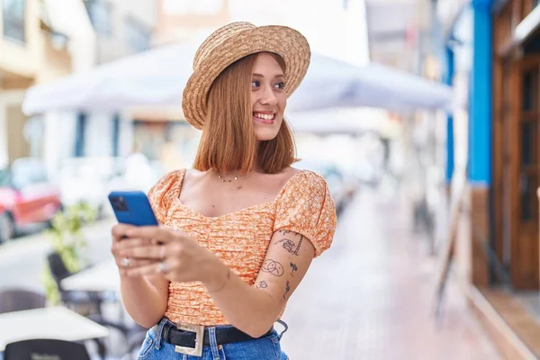 Young Redhead Woman Tourist Wearing Summer Hat Using Smartphone Street — Stockfoto