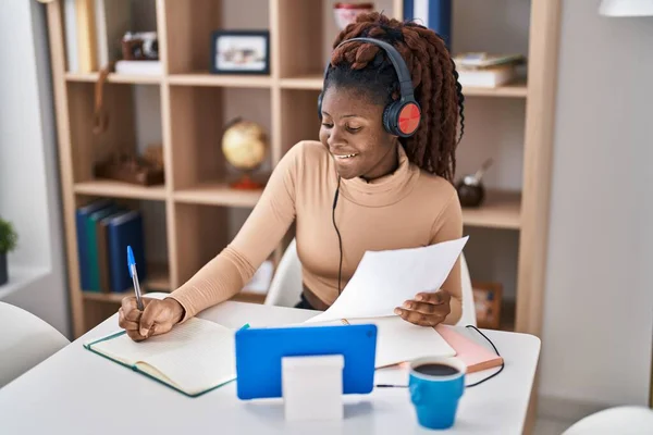 African American Woman Student Listening Music Writing Notebook Home — Foto de Stock