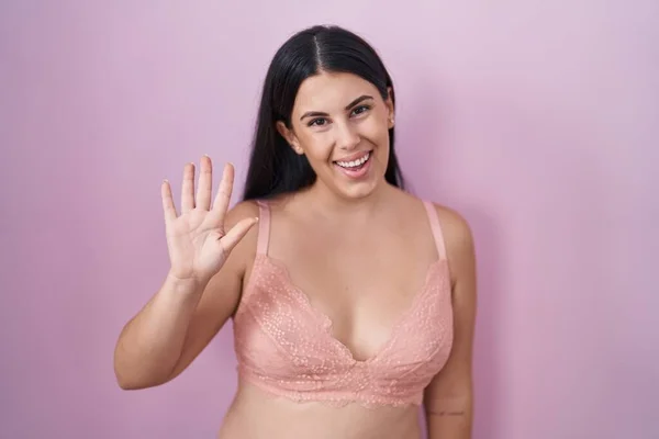 Young Hispanic Woman Wearing Pink Bra Waiving Saying Hello Happy — Stock Photo, Image