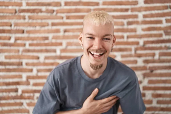 Young Caucasian Man Standing Bricks Wall Smiling Laughing Hard Out — Stock Photo, Image