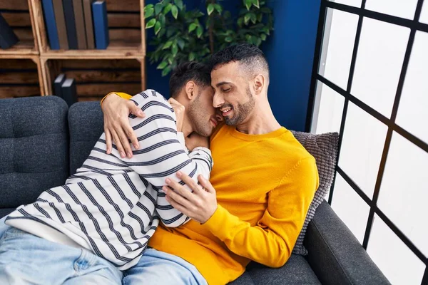 Two Man Couple Hugging Each Other Sitting Sofa Home —  Fotos de Stock