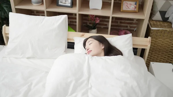 Young Chinese Woman Lying Bed Sleeping Bedroom — Stockfoto