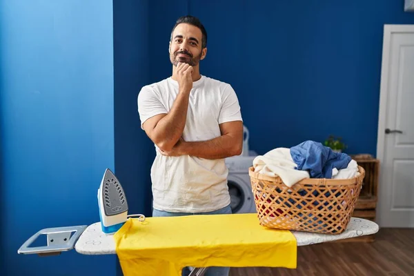 Young Hispanic Man Beard Ironing Clothes Home Smiling Looking Confident — Stock Photo, Image