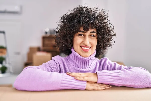 Young Middle East Woman Smiling Confident Leaning Package New Home — Fotografia de Stock
