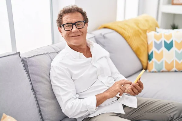 Middle Age Man Using Smartphone Sitting Sofa Home — Photo