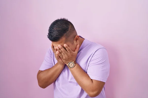 Young Hispanic Man Standing Pink Background Sad Expression Covering Face — Φωτογραφία Αρχείου