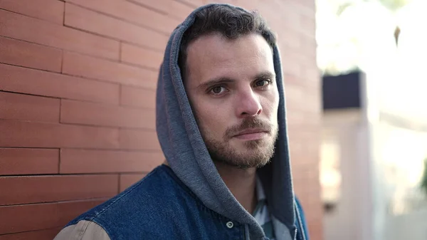 Young Caucasian Man Standing Wearing Hoodie Serious Expression Street — Photo