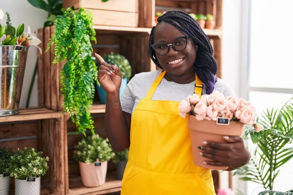 Young African Woman Working Florist Shop Holding Plant Smiling Happy — Stock Photo, Image