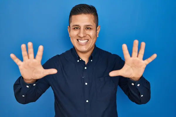 Hispanic Young Man Standing Blue Background Showing Pointing Fingers Number — Stock Photo, Image