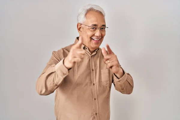 Hispanic Senior Man Wearing Glasses Pointing Fingers Camera Happy Funny — Stockfoto