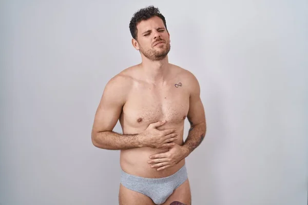 Homem Hispânico Jovem Sem Camisa Usando Underware Com Mão Estômago — Fotografia de Stock