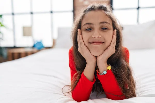 Adorable Hispanic Girl Smiling Confident Lying Bed Bedroom — ストック写真