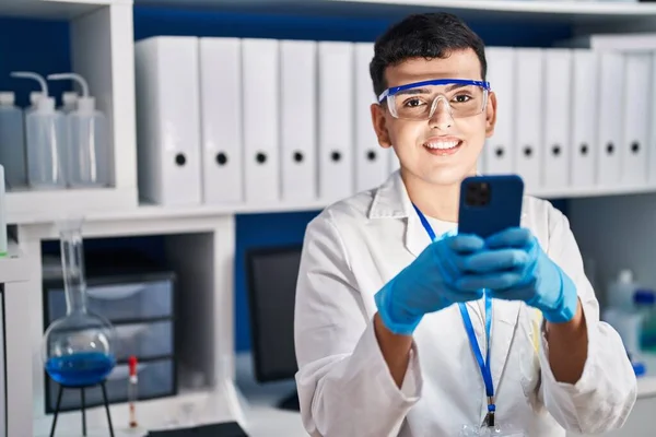 Young Non Binary Man Scientist Smiling Confident Using Smartphone Laboratory — Stock Photo, Image