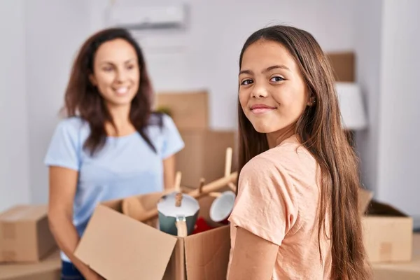 Woman Girl Mother Daughter Holding Package New Home — Stock fotografie