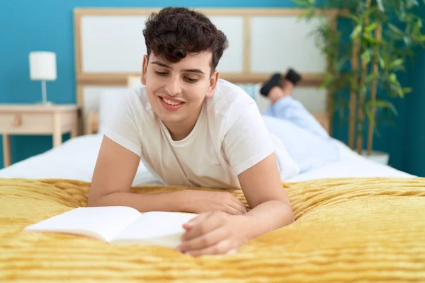 Non Binary Man Reading Book Lying Bed Bedroom — Foto de Stock