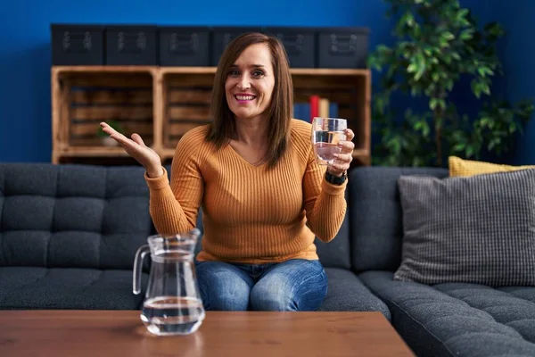 Middle Age Woman Drinking Glass Water Screaming Proud Celebrating Victory — Stock Photo, Image