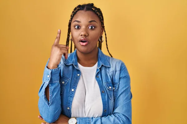 African American Woman Braids Standing Yellow Background Pointing Finger Successful — Photo