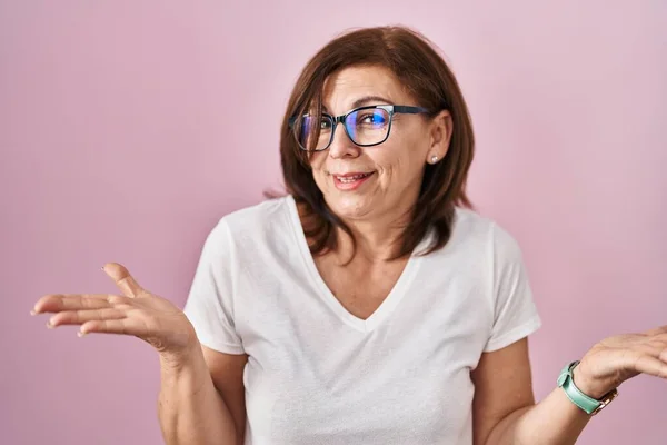 Middle Age Hispanic Woman Standing Pink Background Clueless Confused Expression — Stock Photo, Image