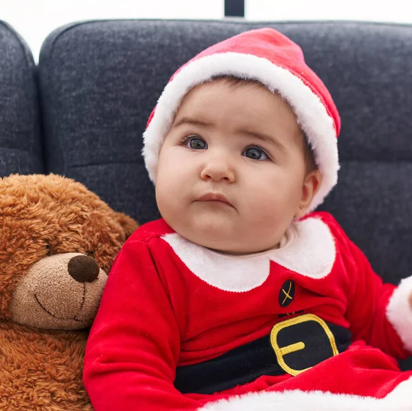 Adorable Hispanic Baby Wearing Christmas Costume Sitting Sofa Home — Stock Photo, Image