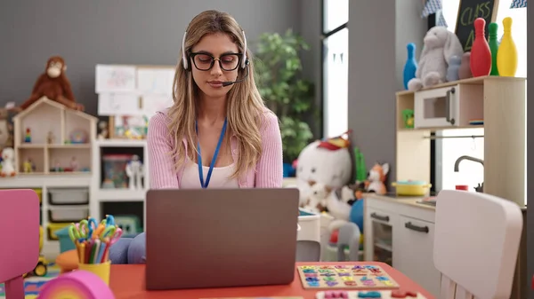 Young Blonde Woman Teacher Using Laptop Working Kindergarten — Stock fotografie