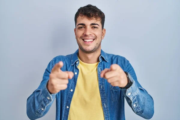 Young Hispanic Man Standing Blue Background Pointing You Camera Fingers — Stock fotografie