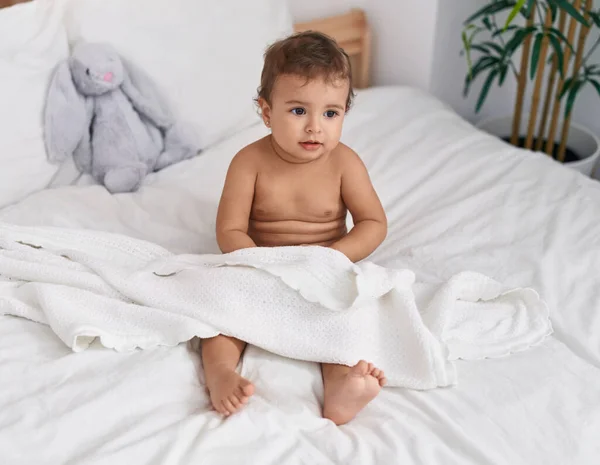 Adorable Hispanic Baby Sitting Bed Bedroom — Stok fotoğraf