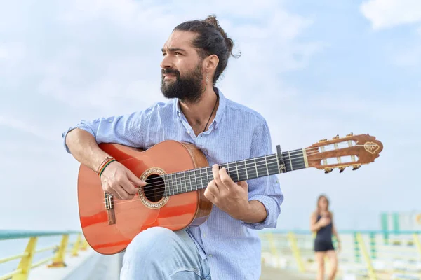 Young Hispanic Man Musician Playing Classical Guitar Seaside Royalty Free Stock Images
