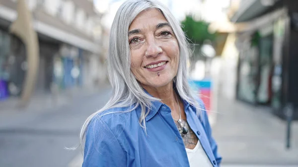 stock image Middle age grey-haired woman smiling confident standing at street