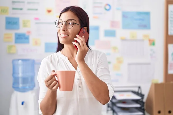 Young Beautiful Hispanic Woman Business Worker Talking Smartphone Drinking Coffee — Stock Photo, Image