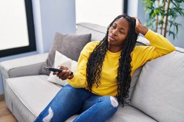 African American Woman Boring Expression Watching Home — 图库照片
