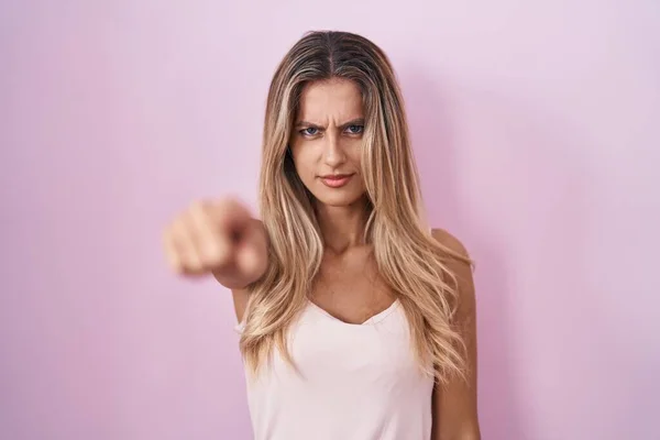 Young Blonde Woman Standing Pink Background Pointing Displeased Frustrated Camera — Photo