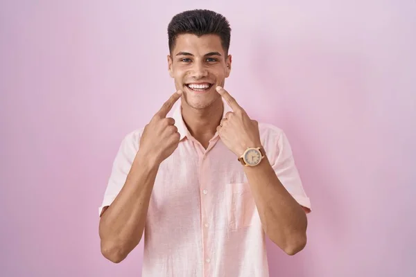 Young Hispanic Man Standing Pink Background Smiling Open Mouth Fingers — Stock fotografie