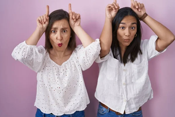 Hispanic Mother Daughter Together Doing Funny Gesture Finger Head Bull — Stock Photo, Image