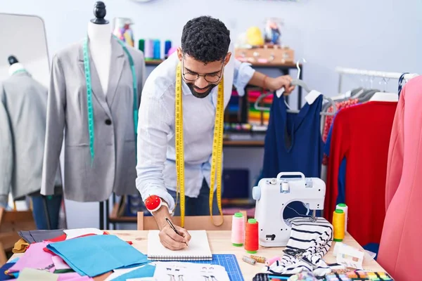 Young Arab Man Tailor Holding Shirt Drawing Notebook Tailor Shop — 图库照片
