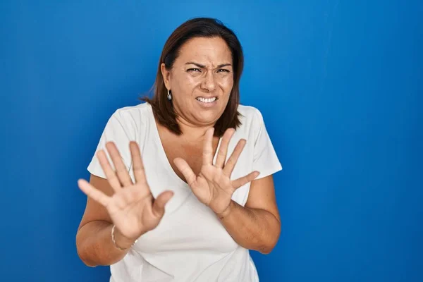 Hispanic Mature Woman Standing Blue Background Disgusted Expression Displeased Fearful — Stock Photo, Image