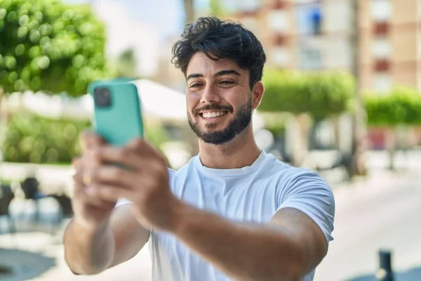 Young Hispanic Man Smiling Confident Making Selfie Smartphone Street — Fotografia de Stock