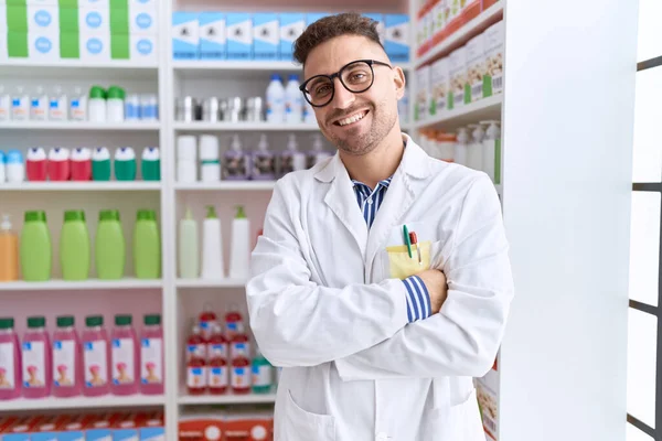 Young Hispanic Man Pharmacist Smiling Confident Standing Arms Crossed Gesture — Stockfoto