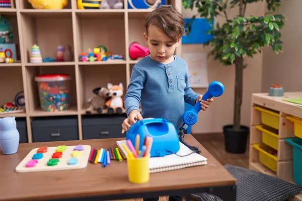 Adorable Hispanic Boy Playing Telephone Toy Standing Kindergarten — Stock Photo, Image