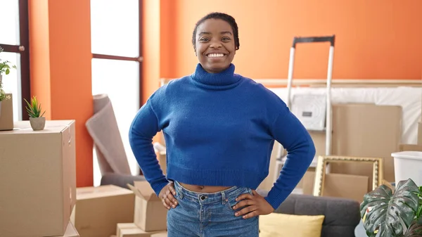 stock image African american woman smiling confident standing at new home