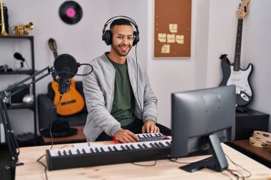 African american man musician having dj session at music studio